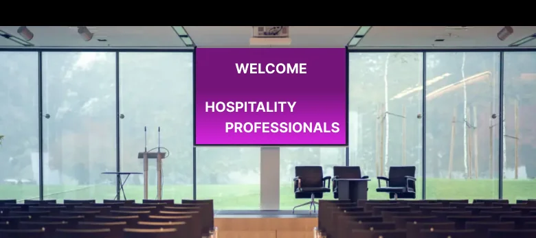 Conference digital signage screen welcoming hospitality professionals
