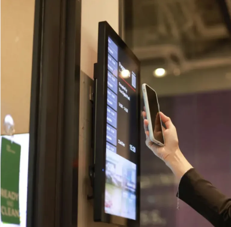 Digital signage screen with qr code interaction using smartphone