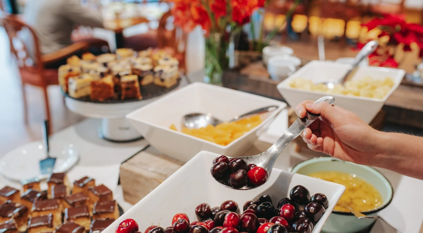 Hotel breakfast buffet with fruits desserts and food selection for promotion