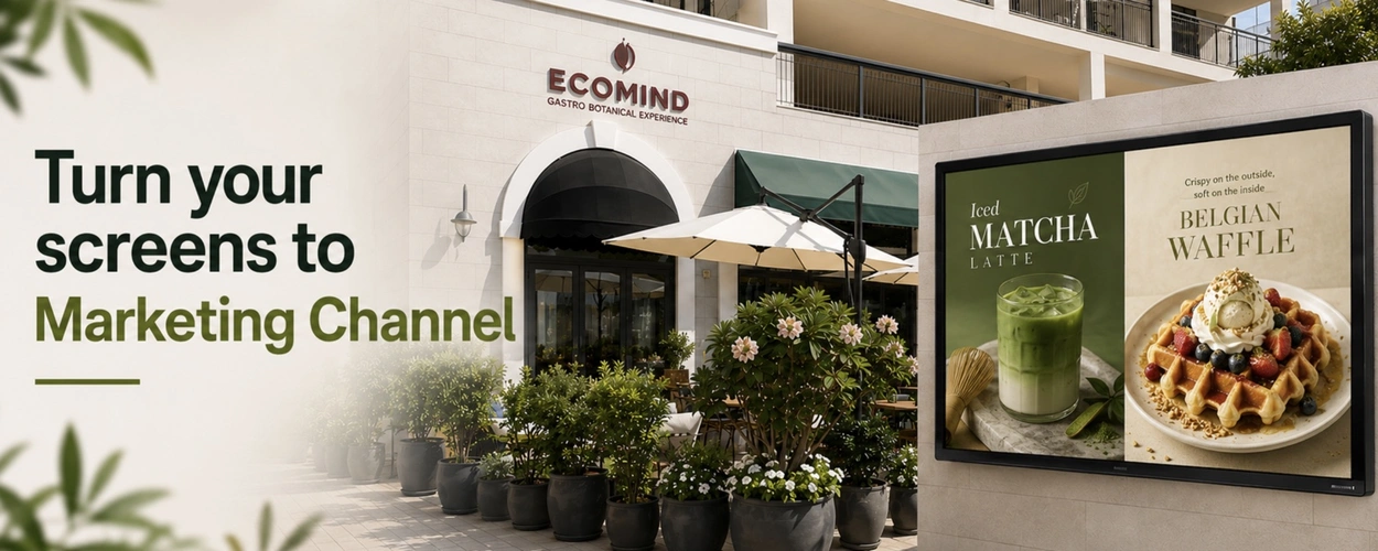 Cafe storefront with outdoor seating and a large billboard showing a matcha latte and Belgian waffle, alongside the bold text 'Turn your screens to Marketing Channel'.