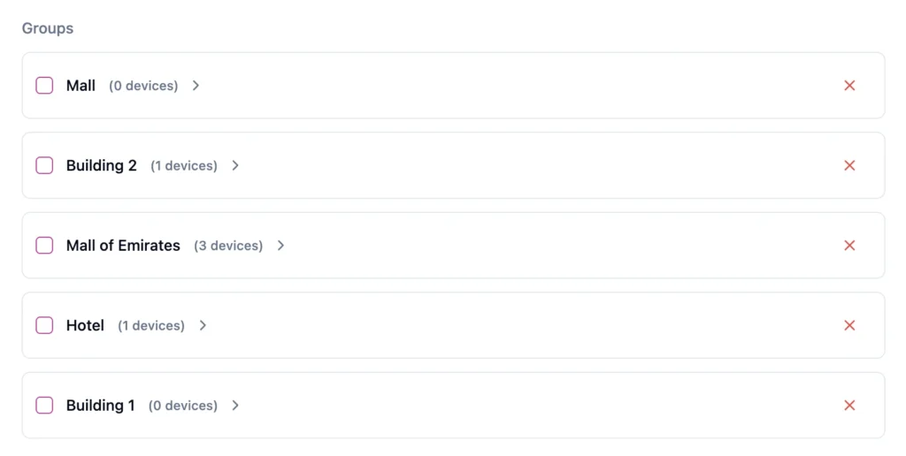 Device Groups screen displaying multiple groups with the number of assigned devices for playlist selection.